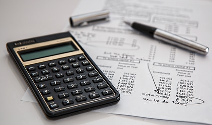 Professionals reviewing business and workforce information
